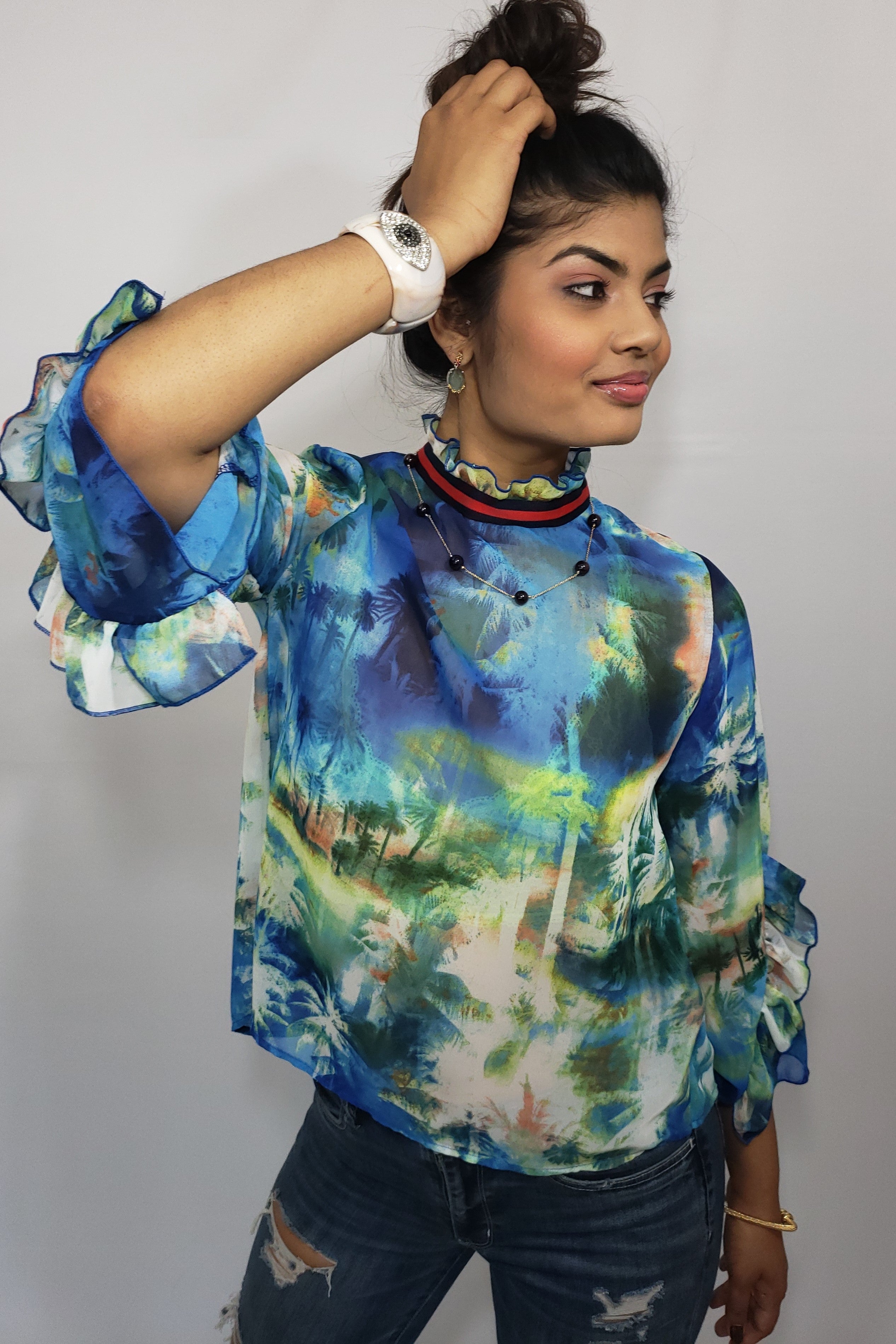 All in the D-Tails Blue Multi-Sheer Blouse