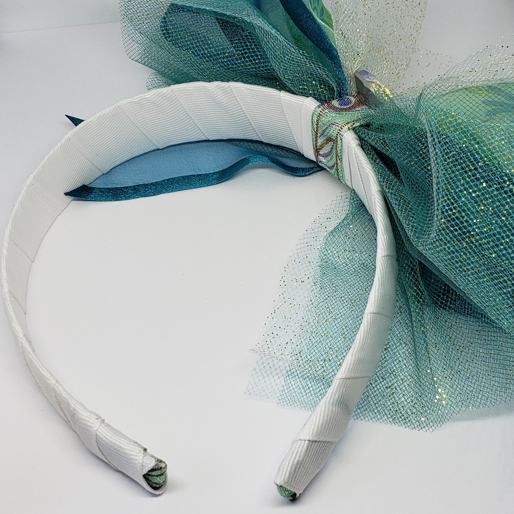 N-Zala Swarovski Peacock Ribbons & Tulle Headband in Teal Green & White - Houzz of DVA Boutique
